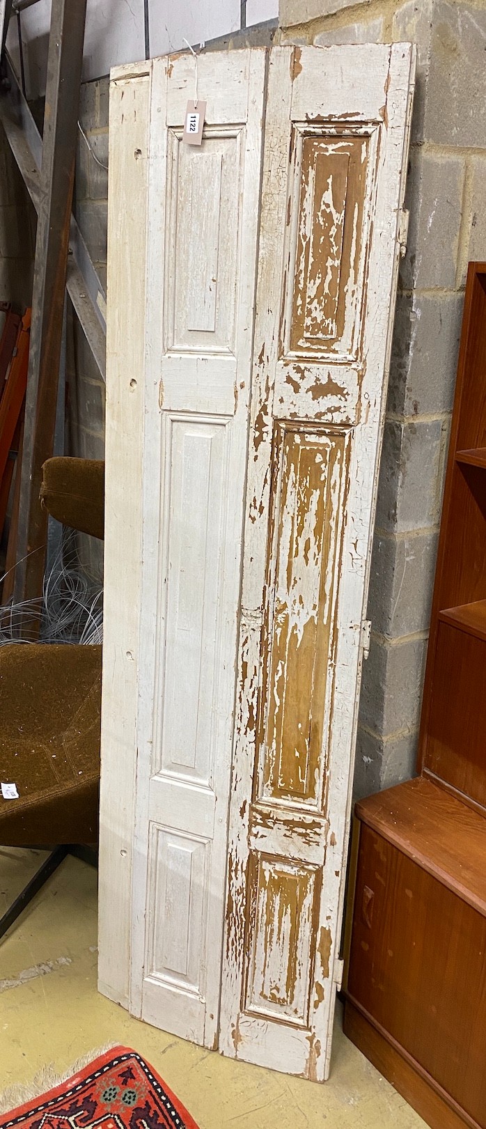 A pair of 19th century painted bifold shutters, height 198cm